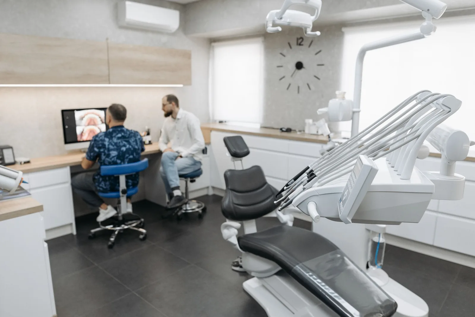 A prosthodontist reviewing a restorative case